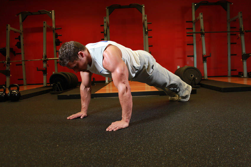 Flexiones: técnica, progresiones y errores comunes — posición inicial